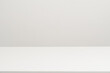 © NanSan - Empty white table top, mock up, white desk and white background.
