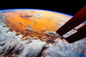 Wall Mural - beauty of africa. orange color lands seen from space. digital enhancement. elements by nasa