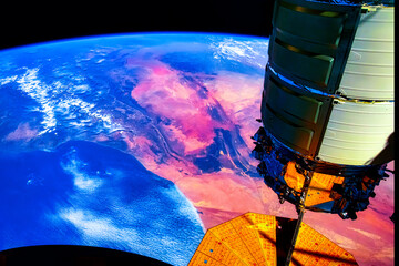Wall Mural - beauty of africa. orange color lands seen from space. digital enhancement. elements by nasa