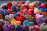 Fototapeta Tęcza - Colorful knitted hearts made by wool. Generative ai