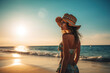 Beautiful woman in hat and swimsuit on the beach at sunset, Generative AI