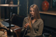 © Guys Who Shoot - Beautiful young woman inhaling hookah girl smoking hookah sitting in lounge bar concept of relaxation and smoking