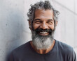 Smiling middle age man with a long beard standing in front of a grey wall. Generative AI.