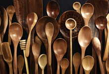Various rustic wooden spoons for cooking, kitchen utensils, tools and equipment