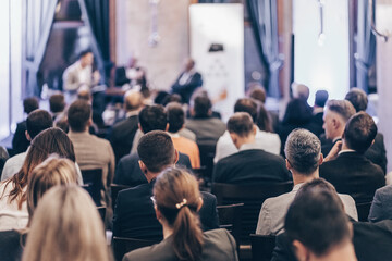 Wall Mural - round table discussion at business convention and presentation. audience at the conference hall. bus