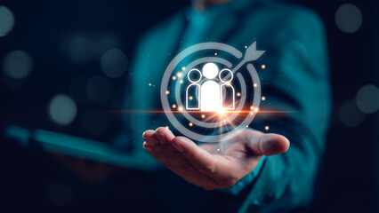 Poster - Businessman showing virtual human icon on dartboard with arrow for business CRM or Customer Relation Management and customer focus target group concept, social media. Digital marketing online.