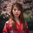 © drixe - Beautiful asian woman with long and straight hair wearing a colorful kimono, looking serious, standing in a background of cherry blossom trees. created with Generative AI
