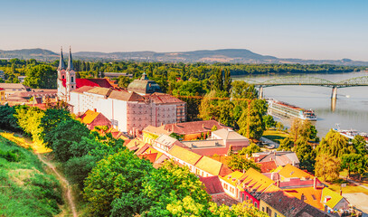 Wall Mural - Historic town from the Esztergom basilica in Hungary. The Danube river and the border bridge to the town of Sturovo in Slovakia.