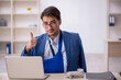 © Elnur - Young male employee after car accident at workplace