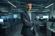 © Khomkrit - The image of a male businessman standing looking confidently at the camera inside a modern office. AI-generated images