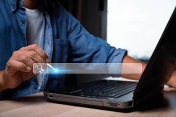 Aufkleber - Searching Browsing Internet Data Information with blank search bar.SearchEngine Optimization SEO Networking Concept.hand of businessman working with computer laptop on desk in office