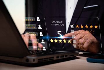 men using laptop to give positive review for client's satisfaction surveys. giving a five star rating. Customer evaluation feedback. Service rating, Customer satisfaction concept