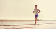 © guas - Fitness, workout, sport and healthy lifestyle concept - sportsman running in the city on a sunny day