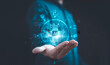 © Dilok - Businessman holding virtual AI or Artificial Intelligence with technology icons include cloud computing chatbot internet banking etc for AI learning management and working behalf of human concept.