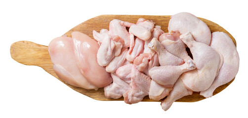 Wall Mural - fresh chicken meat on a wooden board isolated on transparent background, top view