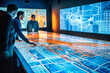 © Real - Professionals discuss infrastructure insights using a large display, leveraging advanced technology to optimize project outcomes