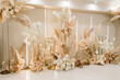 © dyachenkopro - decorative wedding party indoor wall of flowers with yellow light