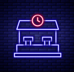 Wall Mural - Glowing neon line Railway station icon isolated on brick wall background. Colorful outline concept. Vector