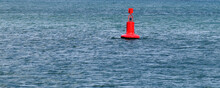 Close-up Of A Red Buoy On The Water For A Horizontal Background