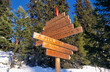 Wooden sign post with directions for cross-country skiers in Norway