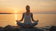 © The Picture House - AI generated Young woman practicing yoga in front of the sea at sunset, Beautiful girl meditate outdoor with handpalms joined over the head , Harmony, meditation, healthy lifestyle and travel concept