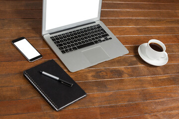 Canvas Print - High angle view of laptop with notepad and cup of coffee