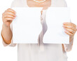 Woman holding ripped page