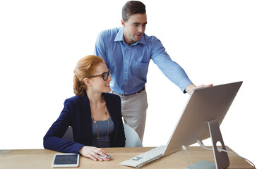 Colleagues discussing over computer at table