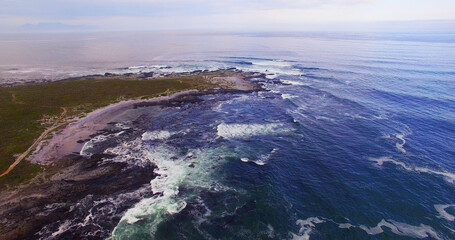 Poster - Scenic view of landscape by seascape