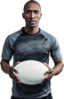 Portrait of sportsman standing with rugby ball