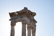 Ancient Ruins of Pergamon Acropolis. Ancient city column ruins with the sun in the background. Close-up. 