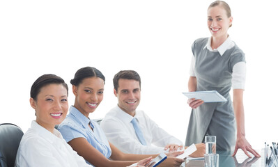 Wall Mural - Portrait of smiling businesswoman with colleagues in conference