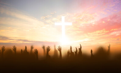 Canvas Print - soft focus of Christian worship with raised hand on white cross background