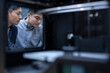 © Blue Jean Images - Confident Chinese designers using a 3D printer