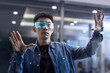 © Blue Jean Images - Young Chinese man wearing futuristic glasses
