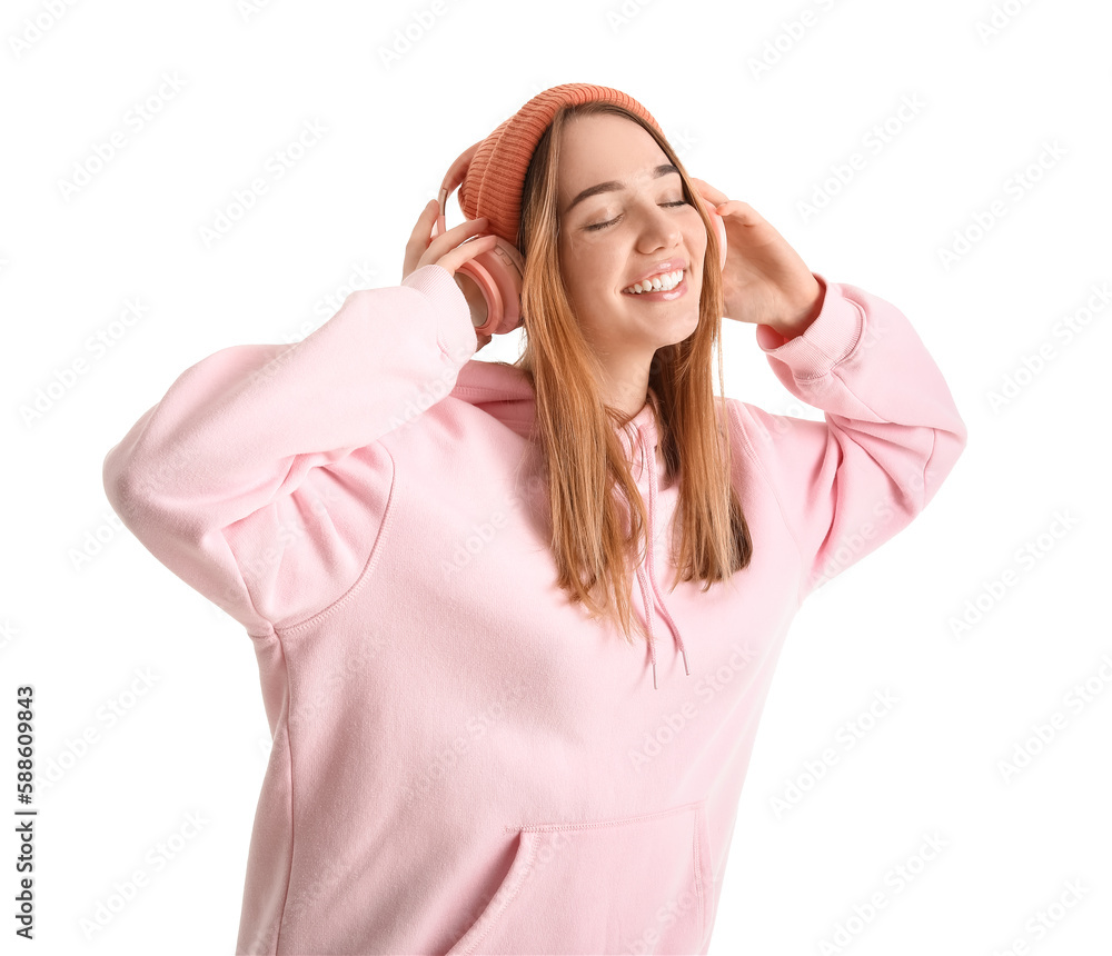 Young woman in headphones on white background