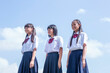 © amanaimages - 土手に立つ中学生