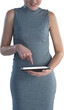 Mid section of smiling businesswoman with digital tablet