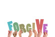 © vectorfusionart - Cropped hands holding colorful word forgive