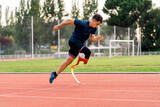 Fototapeta Zwierzęta - Disabled Man Athlete Running