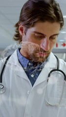 Poster - Animation of caucasian male doctor in hospital over data processing