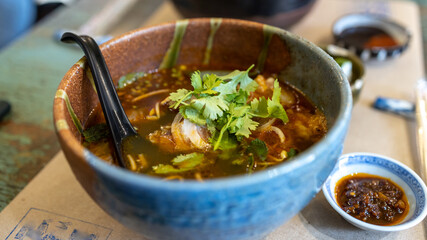 Wall Mural - Popular Traditional Vietnamese rice noodle Bun Bo Hue