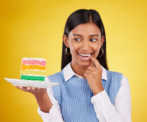 Sticker - Birthday, diet and woman with cake in studio for happy celebration or party on yellow background. Happiness, excited gen z model with rainbow dessert on plate to celebrate milestone or achievement.