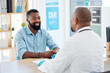 © Nina/peopleimages.com - Doctor, black man and healthcare consultation with a wellness and hospital worker in a office. Consulting, patient and happy male with a smile from health communication and expert advice in a clinic