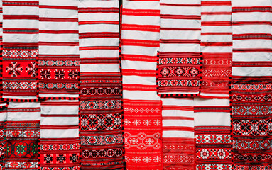 Wall Mural - Linen Towels With Slavic Ethnic National Folks Ornament On Clothes. Slavic Traditional Culture Pattern Ornament Embroidery.