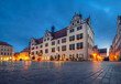 Torgau, Germany. View of the building of historic Town Hall at dusk