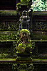 Wall Mural - Spiritual place and temple on Bali, Indonesia. Traditional stone statues