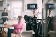 © Anna - Professional cinema and video camera on the set. Shooting shift, lighting fixtures, shooting equipment and the team.