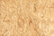 © Victor - Bright contrasting background of chipboard rough texture yellow