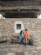 © Sangiao_Photography - Asturias historical building Villanueva heritage. Mixed race couple together outdoor with tablet